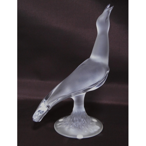 215 - Lalique of France frosted glass figure of a bird (20th century) terminating on a fixed circular foot... 