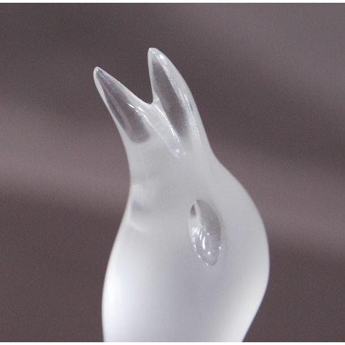 215 - Lalique of France frosted glass figure of a bird (20th century) terminating on a fixed circular foot... 