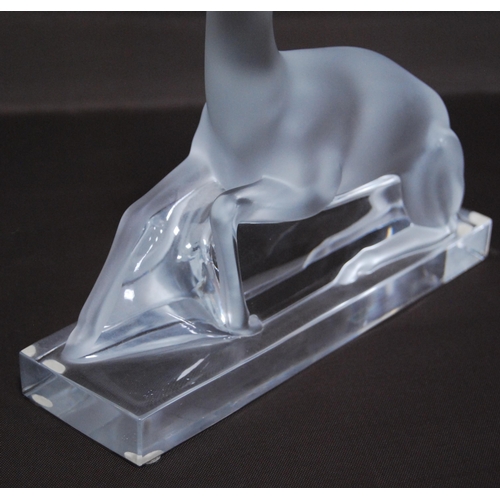 216 - Lalique of France clear and frosted glass figure of a seated deer (20th century) probably designed b... 