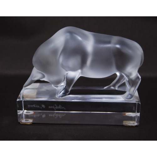 220 - Lalique of France clear and frosted glass figure in the form of a bull (20th century) on a fixed pli... 