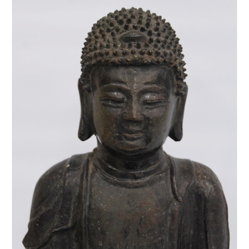 291 - South East Asian antique bronze lacquered medicine Buddha figure in seated meditation, 25cm high.