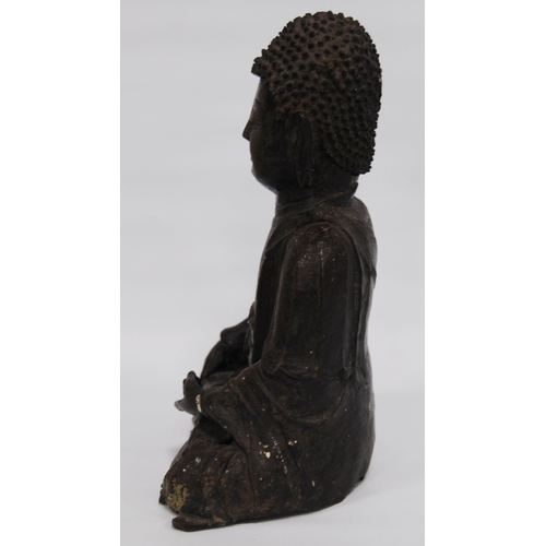 291 - South East Asian antique bronze lacquered medicine Buddha figure in seated meditation, 25cm high.