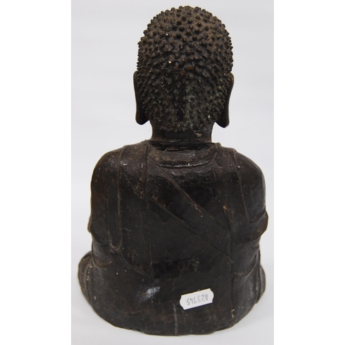 291 - South East Asian antique bronze lacquered medicine Buddha figure in seated meditation, 25cm high.