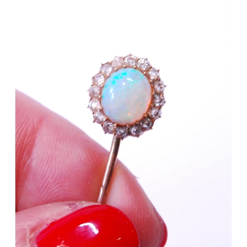 96 - Victorian gold scarf pin with opal and old-cut diamond oval cluster.