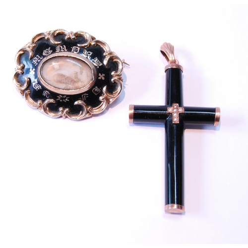 100 - Victorian gold mourning brooch and a similar mounted onyx cross.  (2)