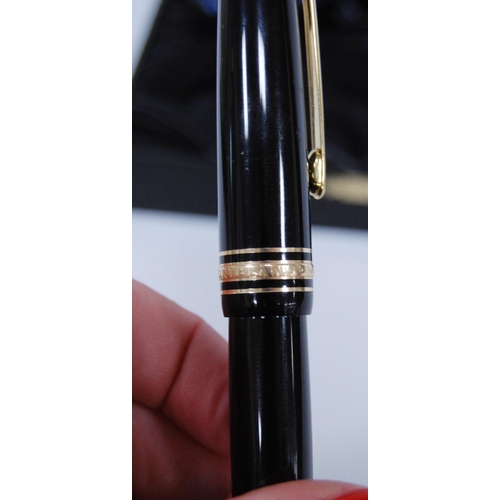 180 - Montblanc Meisterstück fountain pen with 14ct gold nib, no. 4810, with Montblanc ink bottle and cont... 