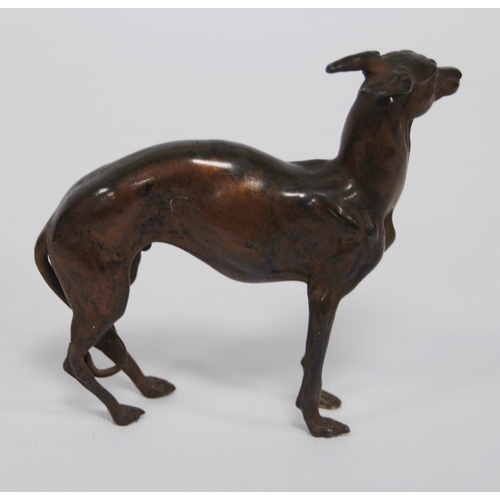 184 - Cast bronze figure modelled as a Norwegian elkhound, 11cm high, and a bronze figure of a greyhound, ... 