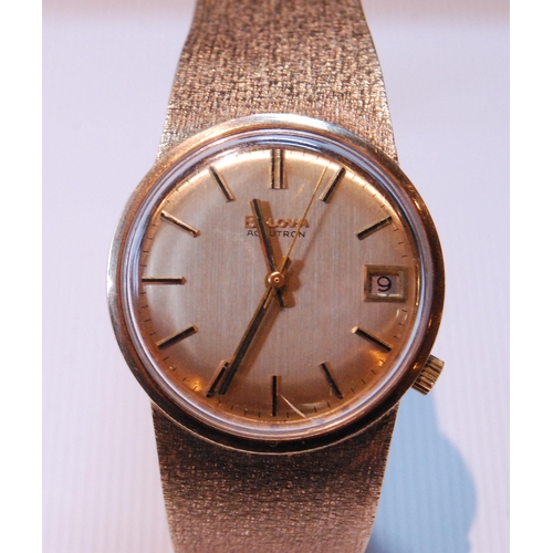 149 - Gent's 9ct gold Bulova Accutron watch on Milanese bracelet, 1973, in original box, 73g gross.