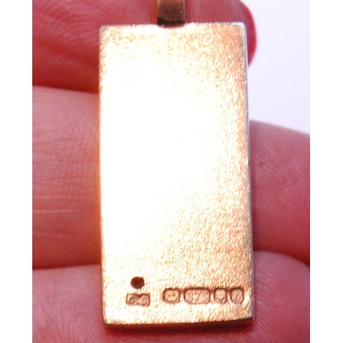 103 - 9ct gold plain rectangular pendant with diamond brilliant, 1978, 8.6g.