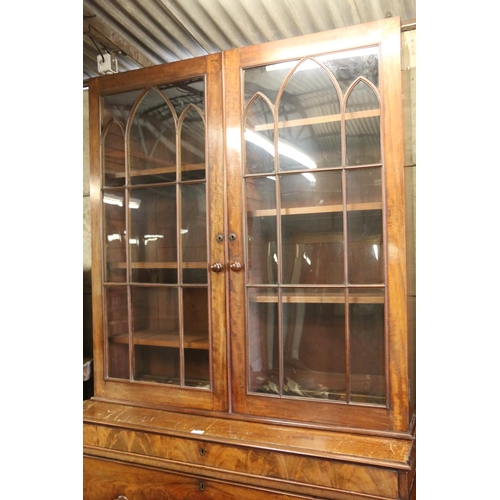 662 - 19th century mahogany secretaire bookcase, the pediment cornice over two glazed doors with arrangeme... 