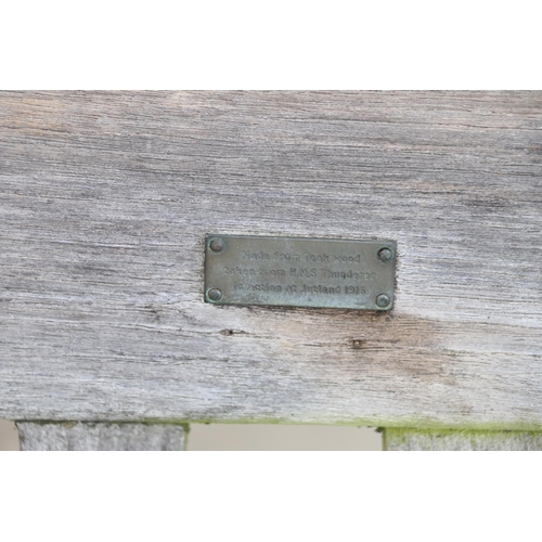 694 - Weathered teak bench, bears plaque 'Made from teak wood taken from HMS Thunderer in action at Jutlan... 