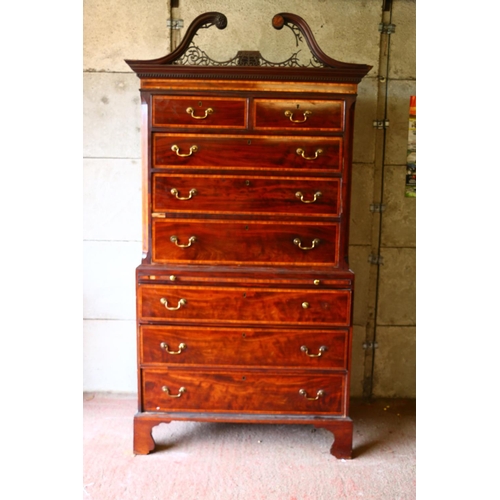 699 - George III mahogany chest on chest, dentil work cornice, the swan neck pediment with fret work, over... 