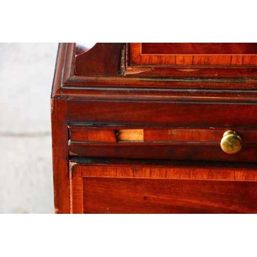 699 - George III mahogany chest on chest, dentil work cornice, the swan neck pediment with fret work, over... 