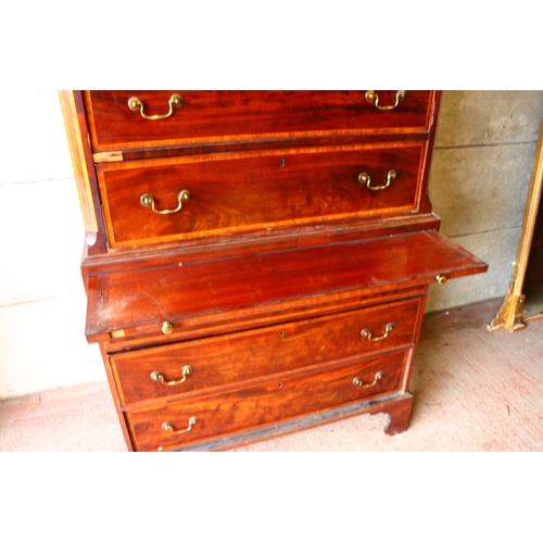 699 - George III mahogany chest on chest, dentil work cornice, the swan neck pediment with fret work, over... 