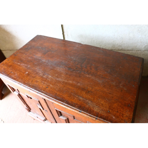 702 - 18th century French oak cabinet, with rectangular top, moulded edge, dentil cornice over two geometr... 