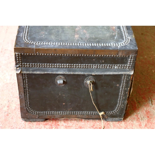 712 - Zanzibar chest, a camphor wood trunk, with studded metal exterior and unfitted interior, 35 x 78 x 4... 