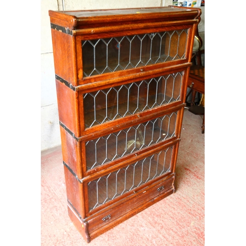 713 - Four-tier Globe Wernicke leaded glazed bookcase, 143 x 90 x 30cm.