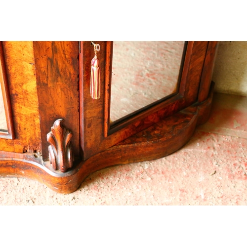 719 - Victorian walnut credenza, with mirror surmount over serpentine marble top, base having central door... 