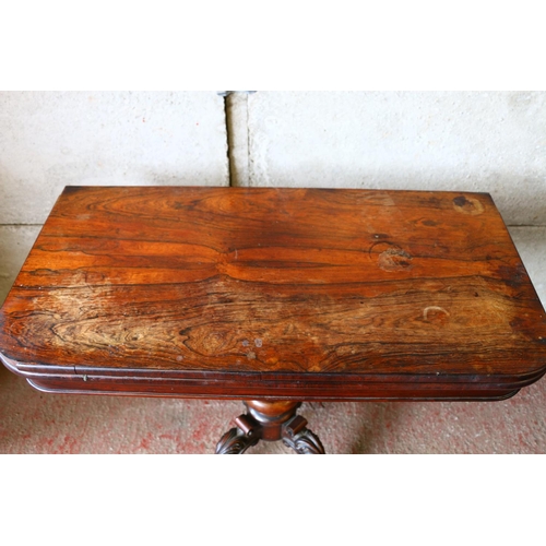 734 - Victorian mahogany fold-over card table, with revolving top, on turned and carved quadruped support,... 