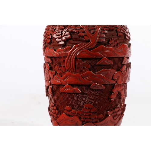 529 - Cinnabar Chinese vase depicting children playing, marked 