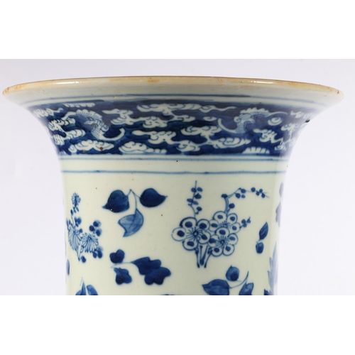 531 - A 19th century possibly earlier Chinese blue and white sleeve vase with flared rim over body with bi... 