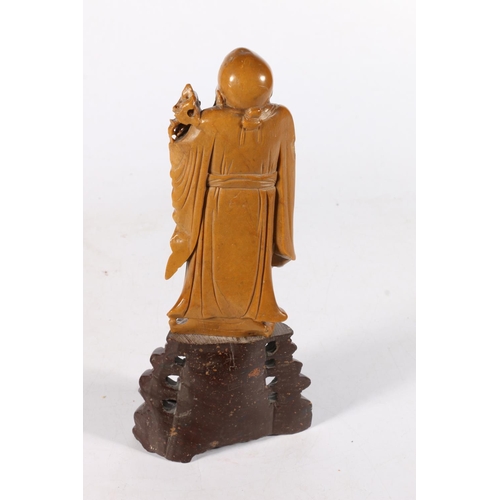 533 - 19th century carved Chinese soapstone figure of Shou Lao, on stone base, 28cm.