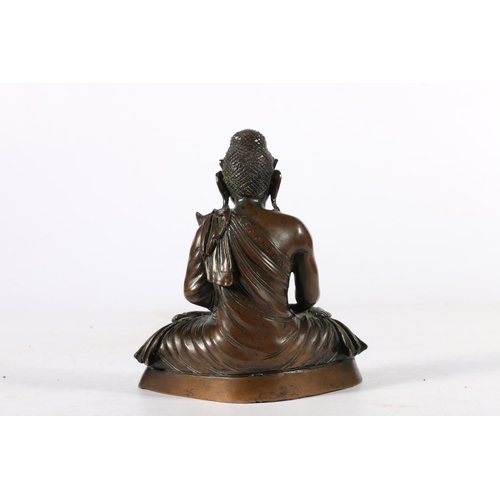 536 - Southeast Asian bronze figure of Buddha in Bhumisparsha, or Earth as Witness, position, 12cm.