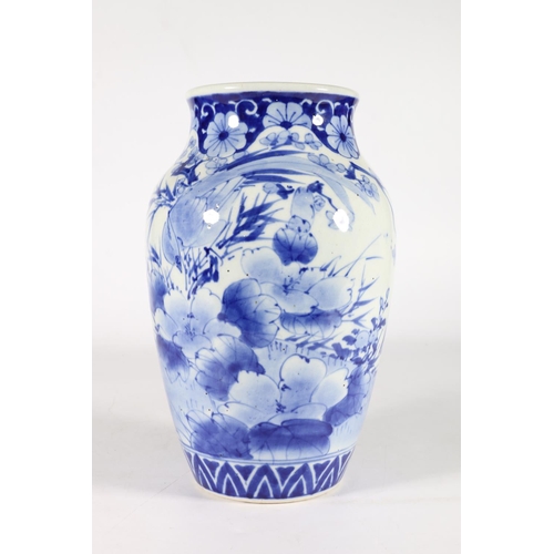 581 - Chinese baluster shaped blue and white vase with birds among flowers, 26cm.