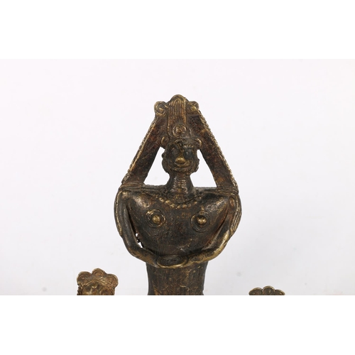 585 - Bronze and metal figures to include a warrior with bow and arrow and snakes on hat, 18cm, etc.