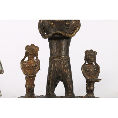 585 - Bronze and metal figures to include a warrior with bow and arrow and snakes on hat, 18cm, etc.