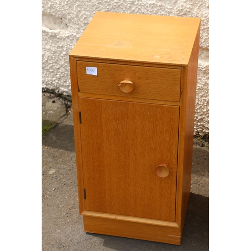 594 - Mid-century oak Meridew four piece bedroom suite comprising a dressing table, a wardrobe, a chest of... 