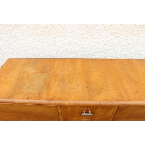 600 - Art Deco limed oak sideboard by Heals of London, the four central drawers flanked by cabinet doors, ... 