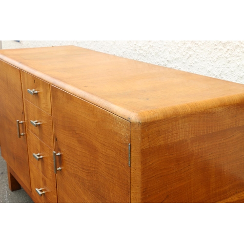 600 - Art Deco limed oak sideboard by Heals of London, the four central drawers flanked by cabinet doors, ... 