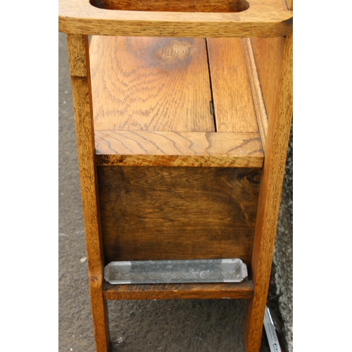 602 - Early 20th century Arts & Crafts oak hallstand, the twin panelled back flanked by six coat hooks... 