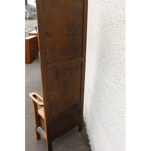 602 - Early 20th century Arts & Crafts oak hallstand, the twin panelled back flanked by six coat hooks... 