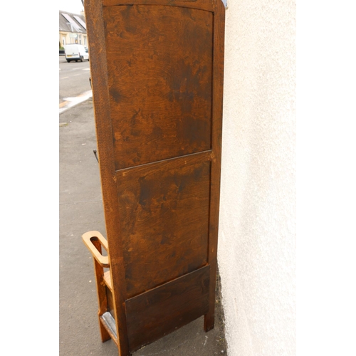 602 - Early 20th century Arts & Crafts oak hallstand, the twin panelled back flanked by six coat hooks... 