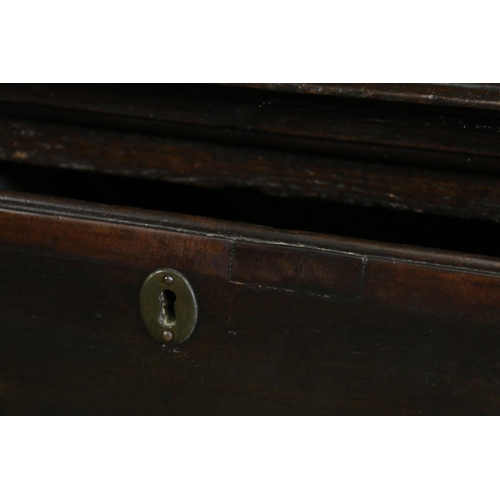 646 - 18th century dresser, the panelled plate rack over base with three drawers, shaped apron, raised on ... 