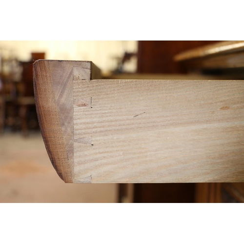 651 - Late 19th/early 20th century open bookcase, on base, with the moulded cornice over adjustable shelve... 