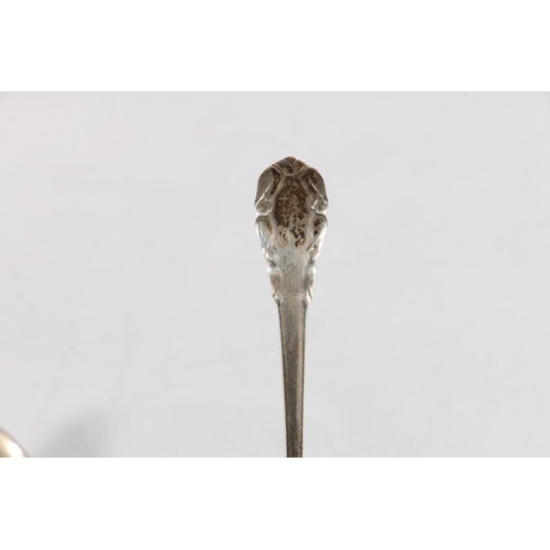 50D - Georg Jensen of Denmark, a silver double spouted ladle, 12.5cm long, 21.6g, also a Scandinavian silv... 