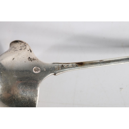 50D - Georg Jensen of Denmark, a silver double spouted ladle, 12.5cm long, 21.6g, also a Scandinavian silv... 