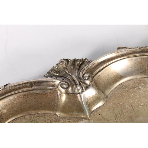 50F - George V silver twin-handled tray with piecrust Rococo scroll and acanthus border, having presentati... 