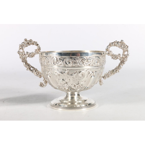 50P - Victorian silver twin handled sugar bowl with embossed scrolling foliate decoration by Wakely & ... 