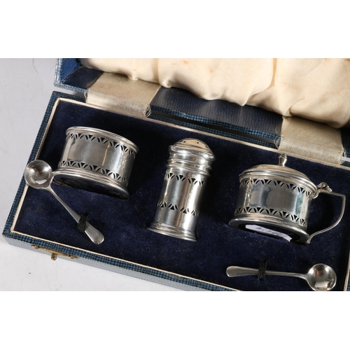 61 - Silver three-piece cruet set by William Suckling Ltd, Birmingham, various dates with non-matching sp... 