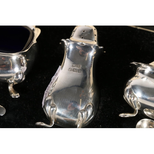 61 - Silver three-piece cruet set by William Suckling Ltd, Birmingham, various dates with non-matching sp... 