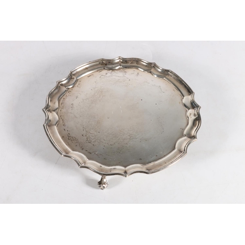 65 - Silver salver with scalloped edge on scrolled feet hallmarked Roberts & Dore Ltd, Birmingha... 