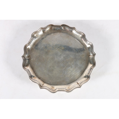 66 - Tiffany silver footed salver, with crest of arm holding sword over Deo Juvante Vinco, inscribed to b... 