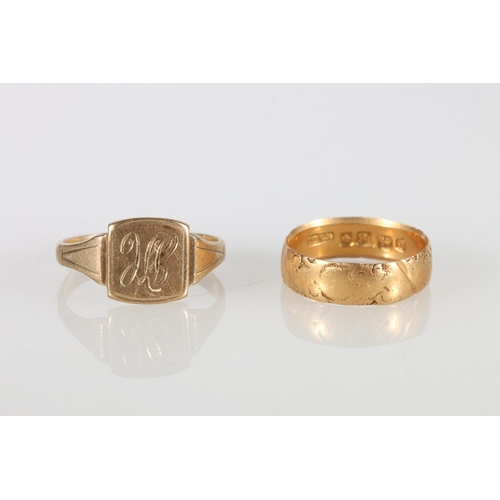 141 - 18ct gold wedding band ring with incised floral design, size O, 3.7g and a 9ct gold signet ring, siz... 