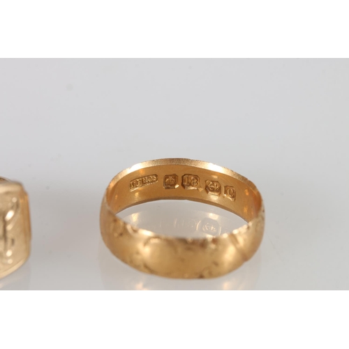 141 - 18ct gold wedding band ring with incised floral design, size O, 3.7g and a 9ct gold signet ring, siz... 