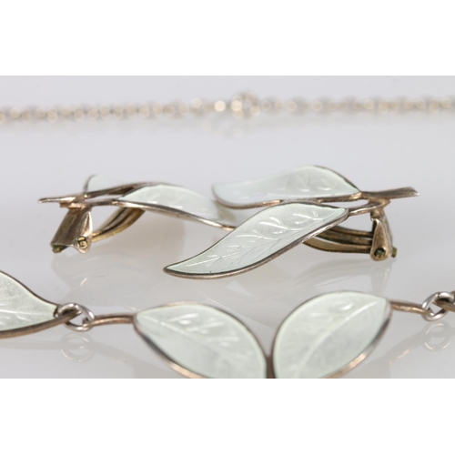 181 - Willy Winnaess for David Andersen of Norway, a Norwegian Sterling silver and white enamel leaf link ... 