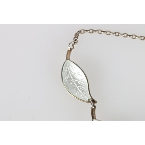 181 - Willy Winnaess for David Andersen of Norway, a Norwegian Sterling silver and white enamel leaf link ... 